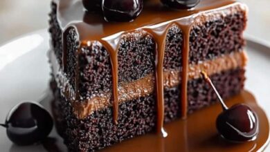 Indulgent Chocolate Cherry Layer Cake with Caramel Sauce