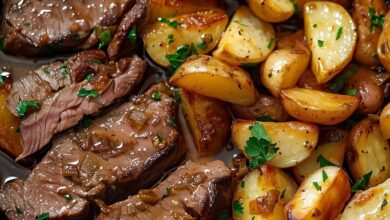 Perfectly Roasted Beef with Garlic Herb Potatoes: A Hearty and Delicious Meal